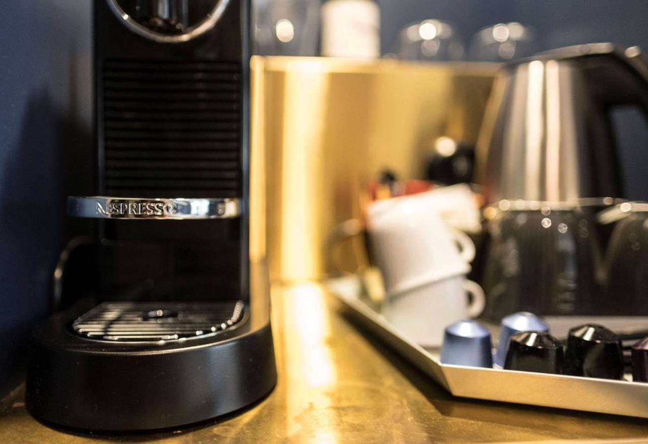 Radisson Collection, Strand Hotel, Stockholm Bagian luar foto A Nespresso Vertuoline coffee machine