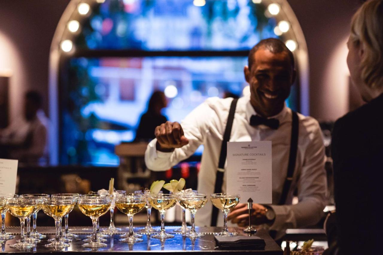 Radisson Collection, Strand Hotel, Stockholm Bagian luar foto A bartender at work